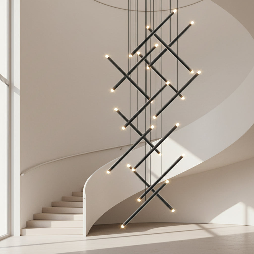 Modern chandelier hanging above a staircase in a minimalistic setting